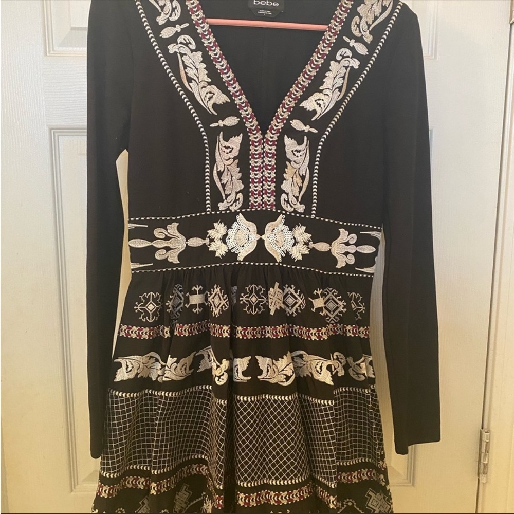 Beautiful long sleeve poofy Bebe dress